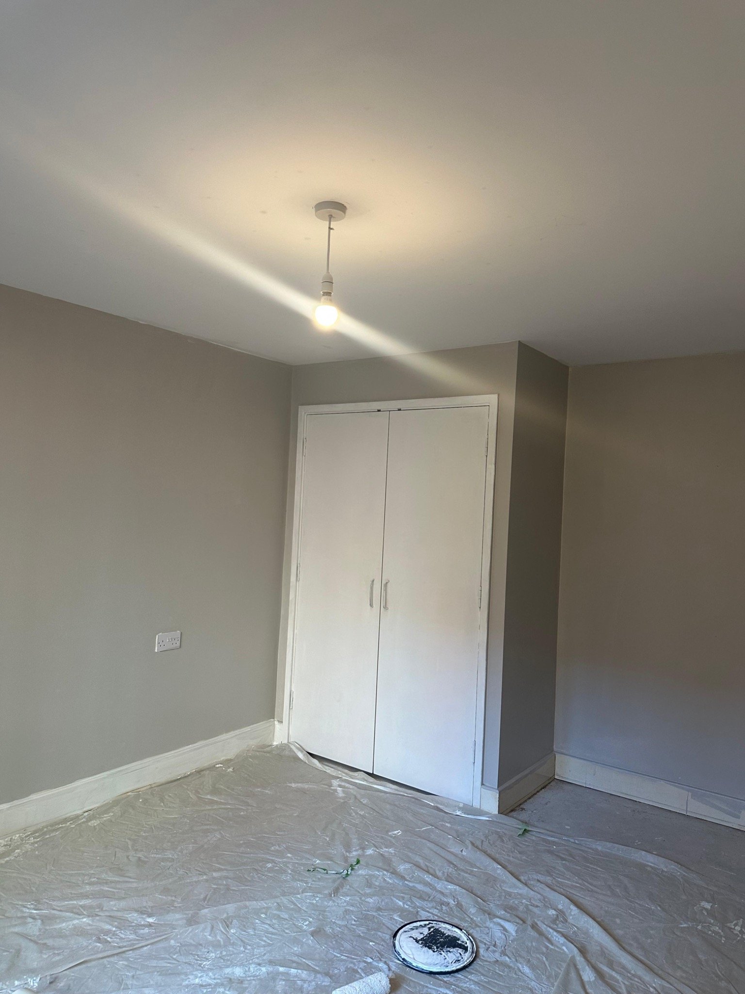Hallway decorated, floors protected with sheets